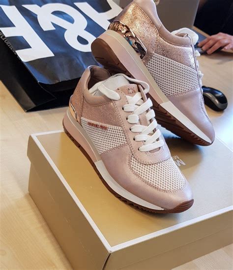 Michael Kors rose gold trainers